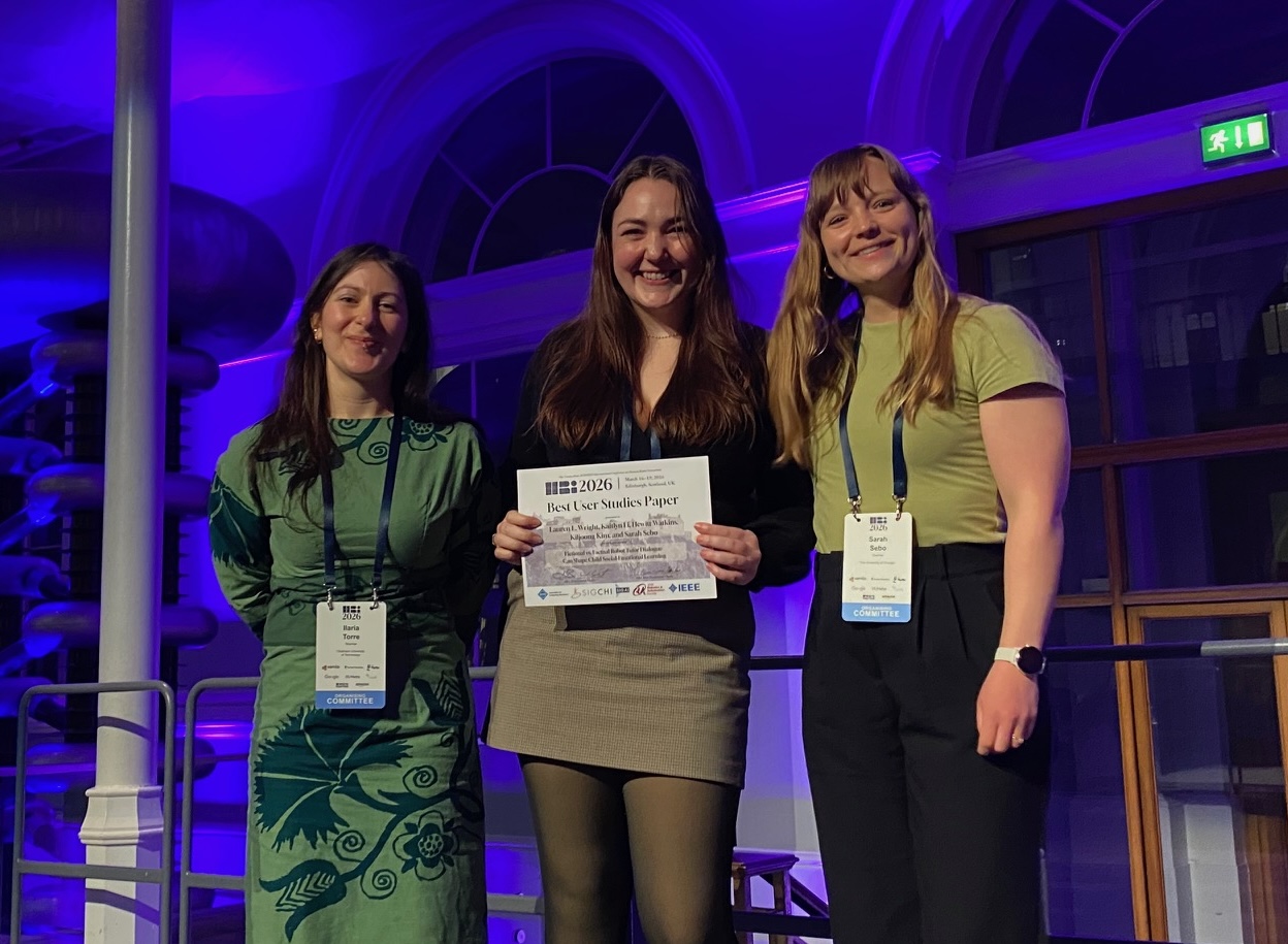 Lauren Wright with Best Paper Award at HRI 2026